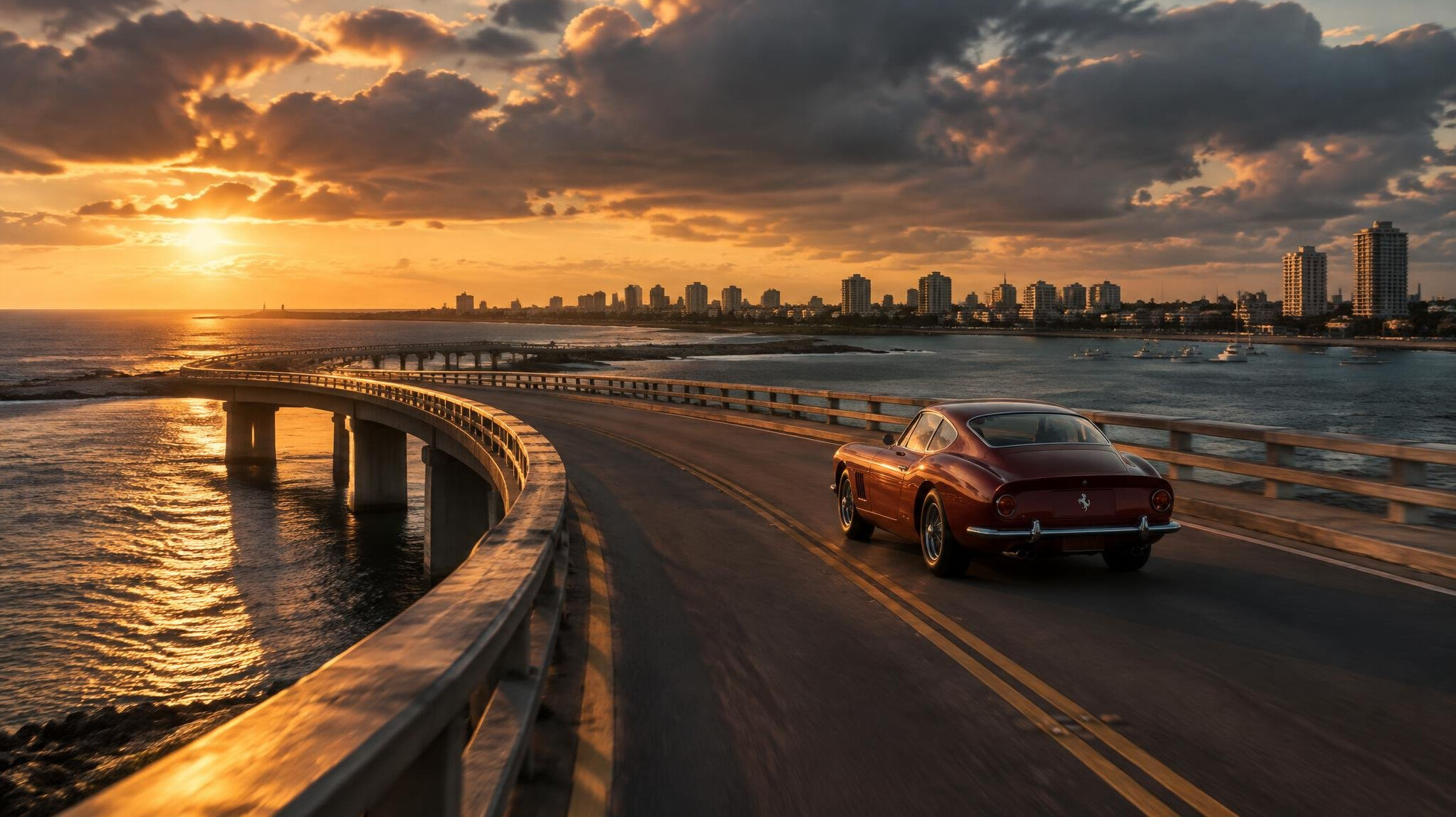 Vintage sports car crossing the Puente de la Barra at sunset in Punta del Este