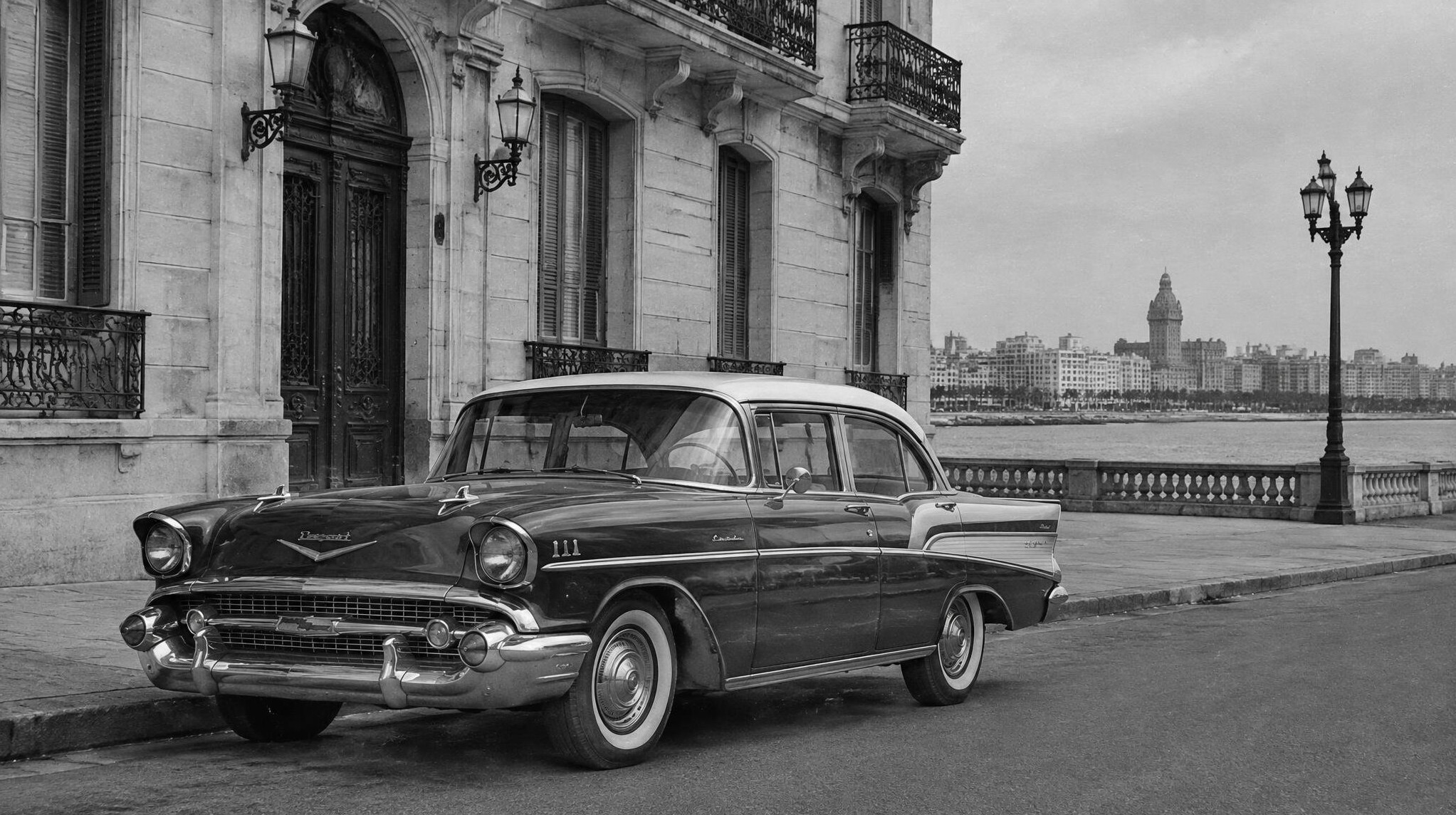 Archival black and white photograph of a classic automobile from the 1950s